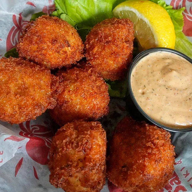A delicious combination of chopped Shrimp and diced jalapeños panko encrusted then fried to perfection. Served with remoulade.