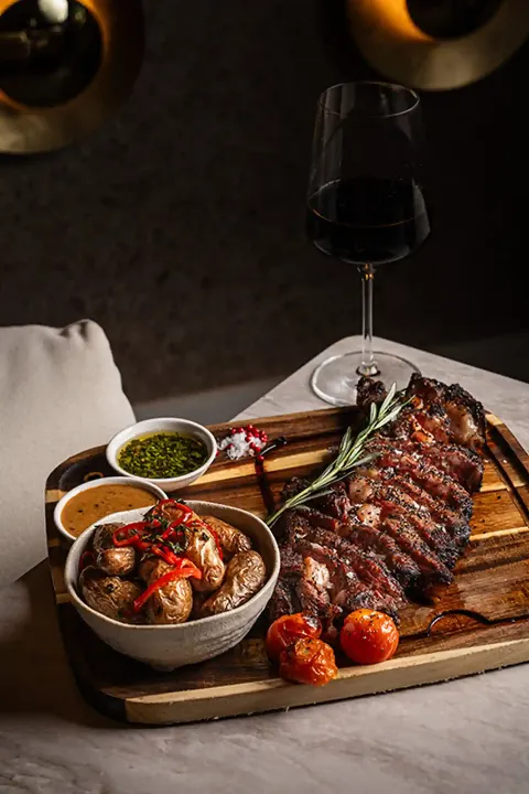 mediterranean dish with red wine at ziva miami mediterranean restaurant in midtown