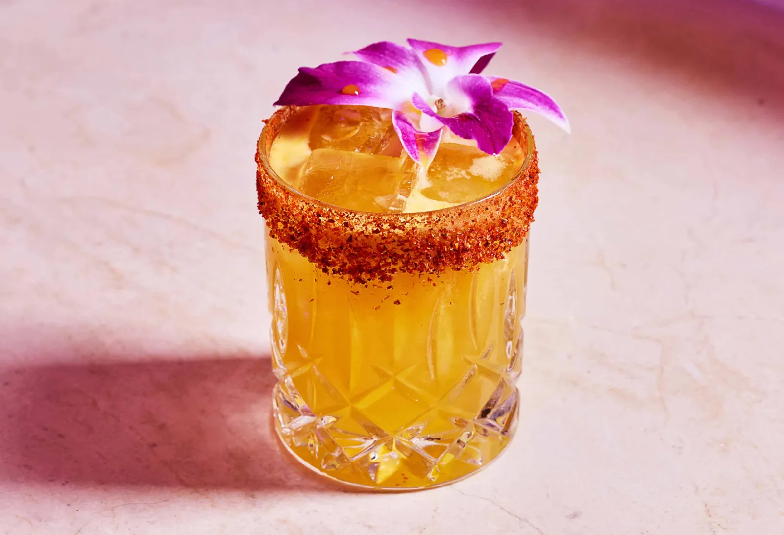 Yellow tropical cocktail with tajin rim at L Bar at Seminole Hard Rock Hollywood