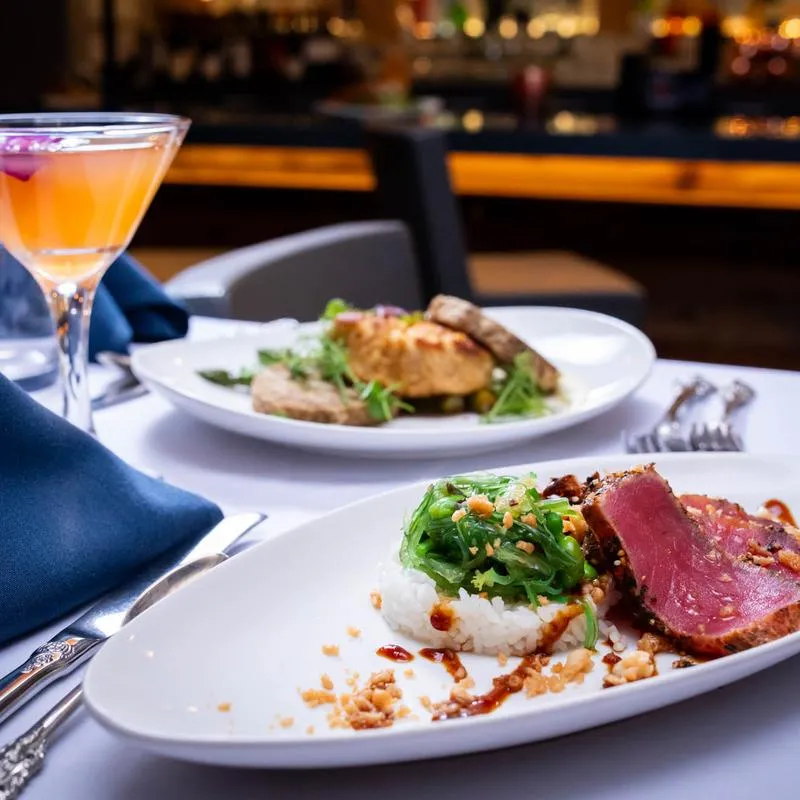 Togarashi Tuna, Crab Cake, and Honeymoon Phase cocktail.
