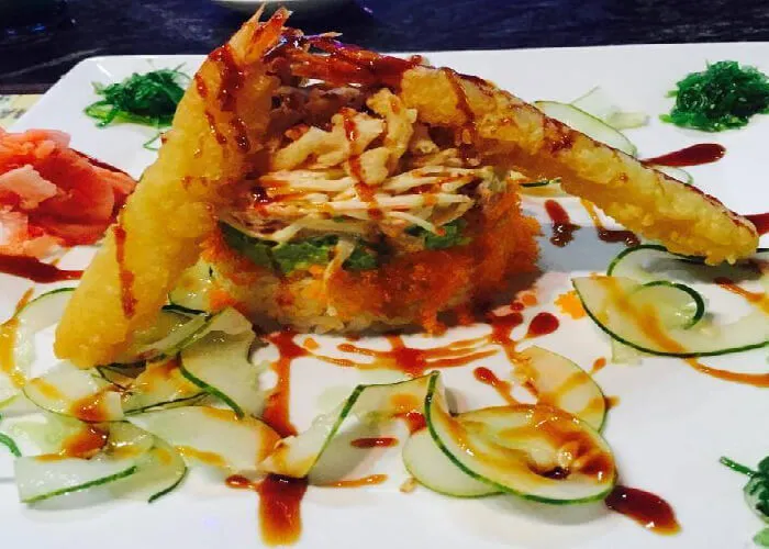 A plate of food with some sauce on it