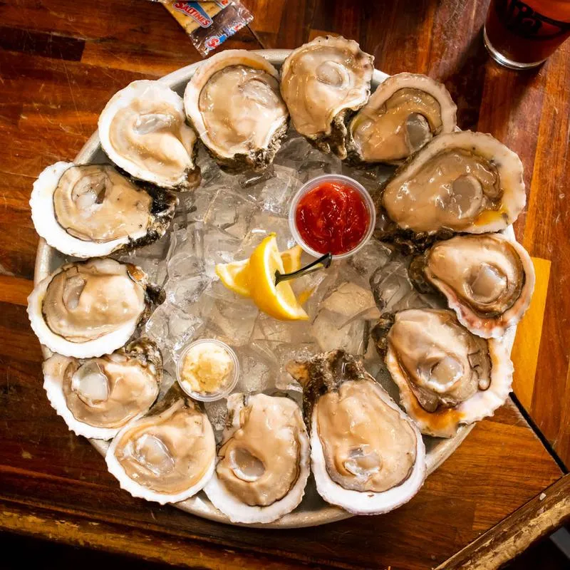 12 raw oysters served with lemon and cocktail sauce