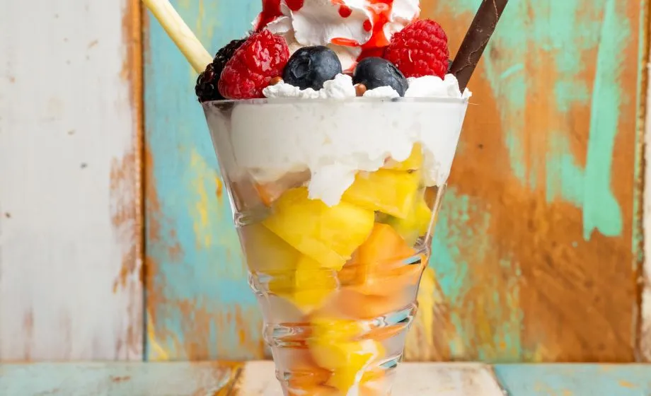 A Glass With Ice Cream And Fruit