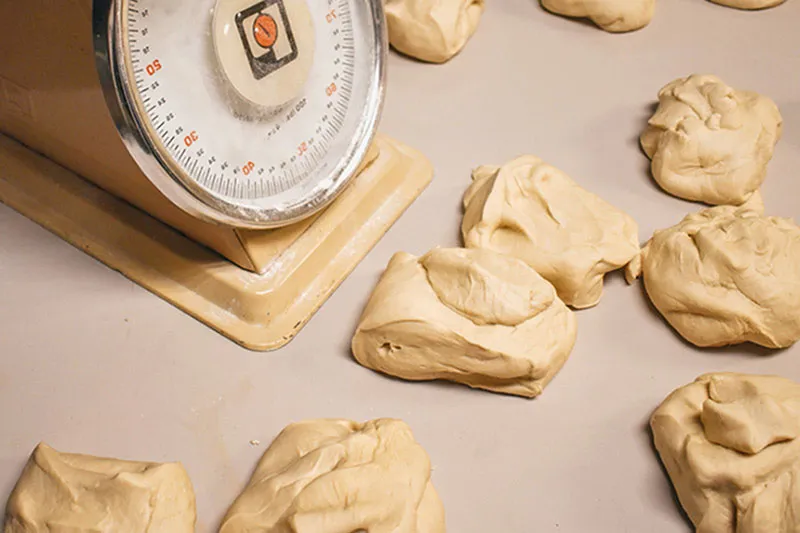 Pizza dough with scale