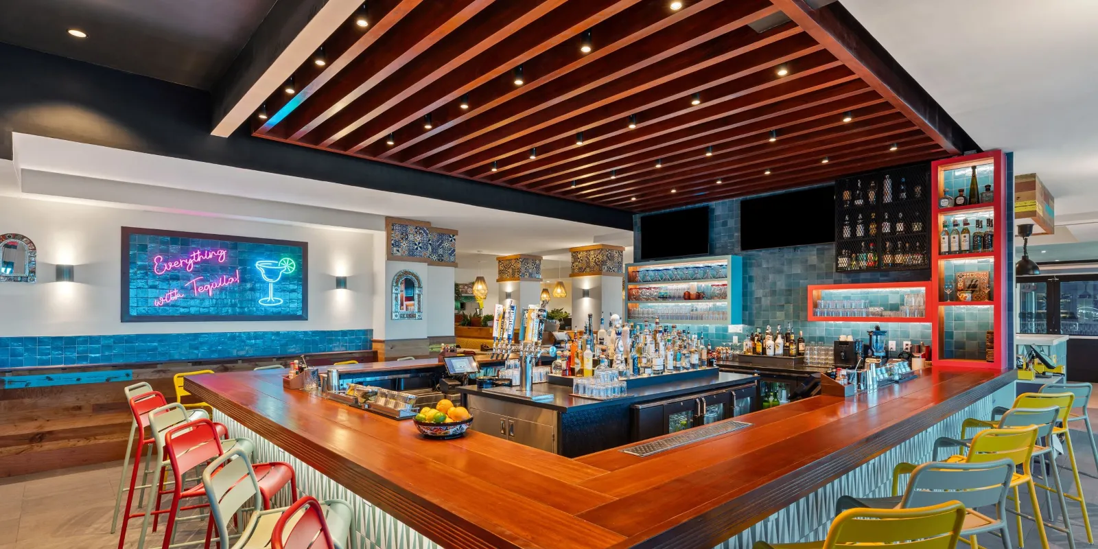 A Bar With A Bar And Chairs