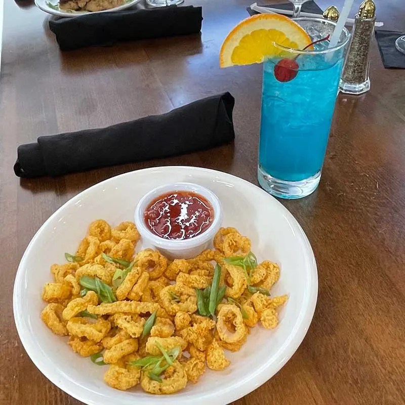 Calamari and blue cocktail from Oceans restaurant