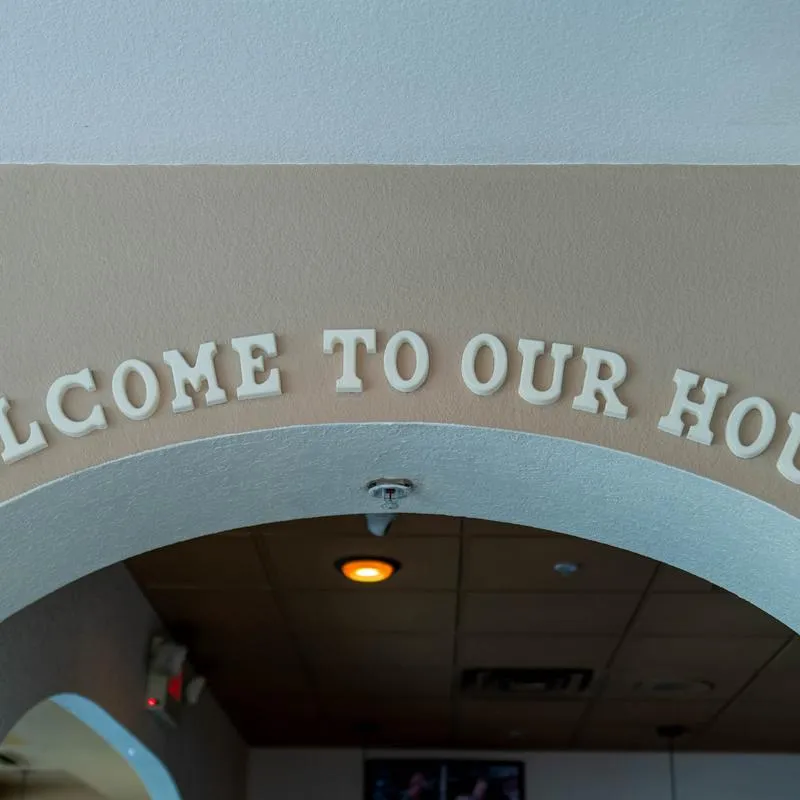 Welcome sign above the restaurant's entrance.