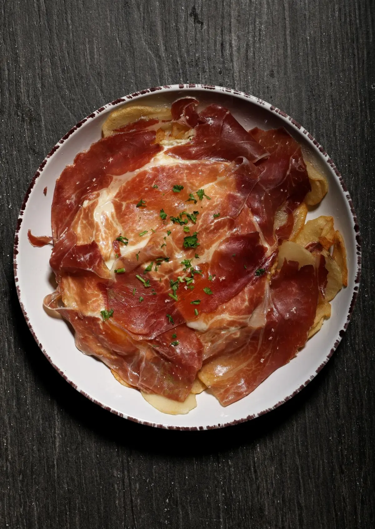 Huevos rotos with jamon