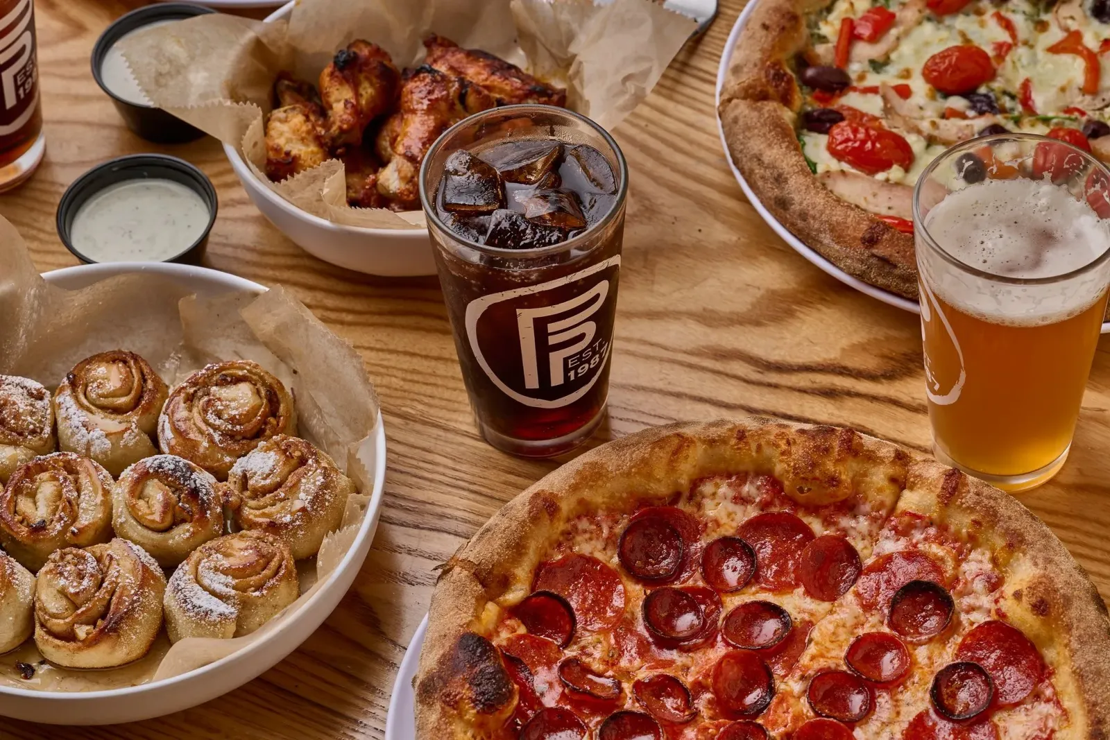 Pizza, wings and cinnamon buns at Flippers Pizza Co in Dr. Phillips Orlando FL