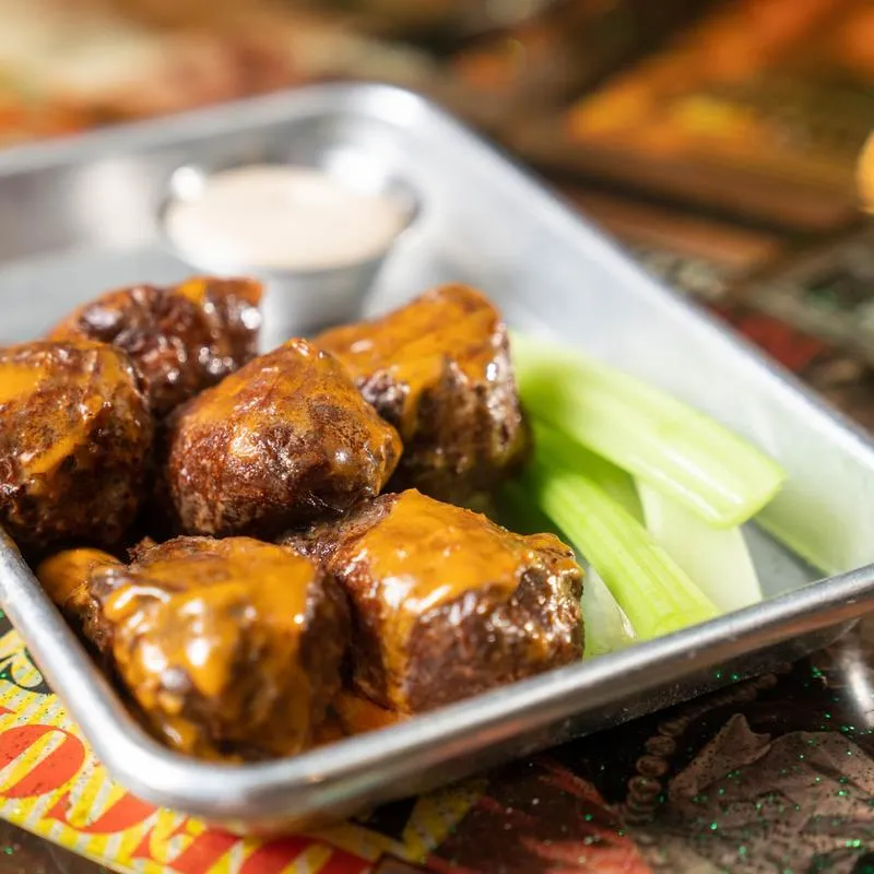 Wings with sauce dip and celery