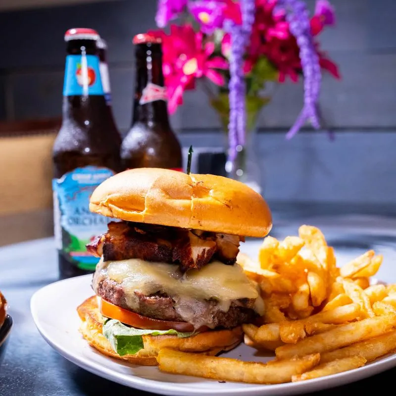 Banksy burger with fries and beers.
