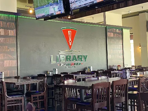 sports bar, tvs, chairs and tables