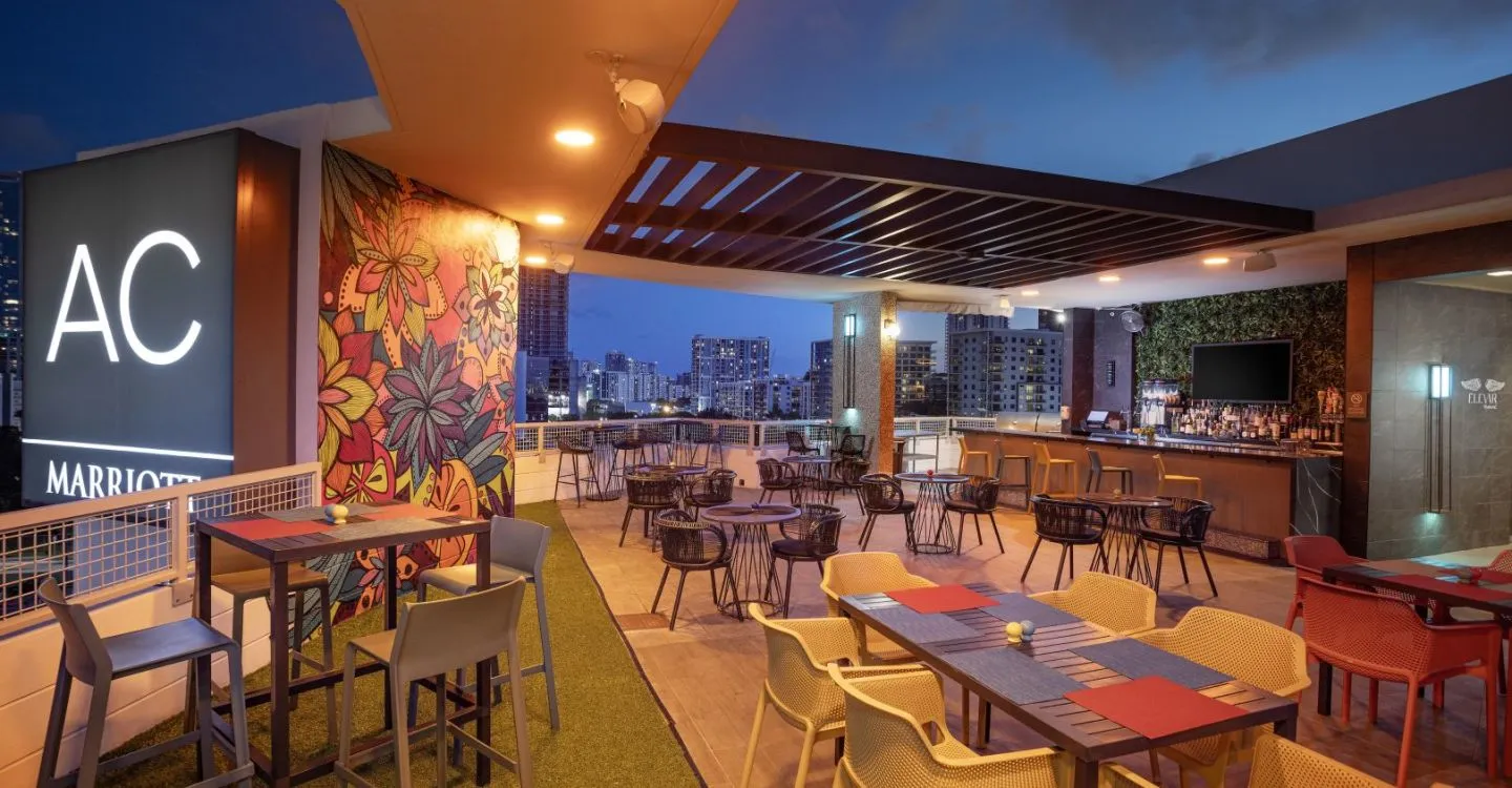 A Restaurant With Tables And Chairs