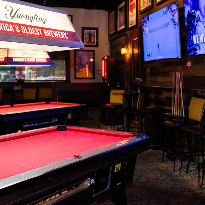 Interior, pool tables and TVs.