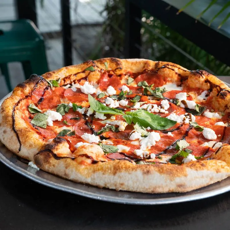 Pepperoni pizza, with goat cheese, basil and balsamic.