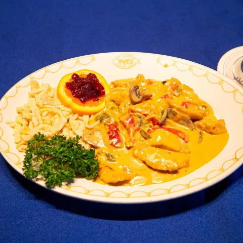 Chicken Stroganoff, in creamy mushroom bell pepper sauce.