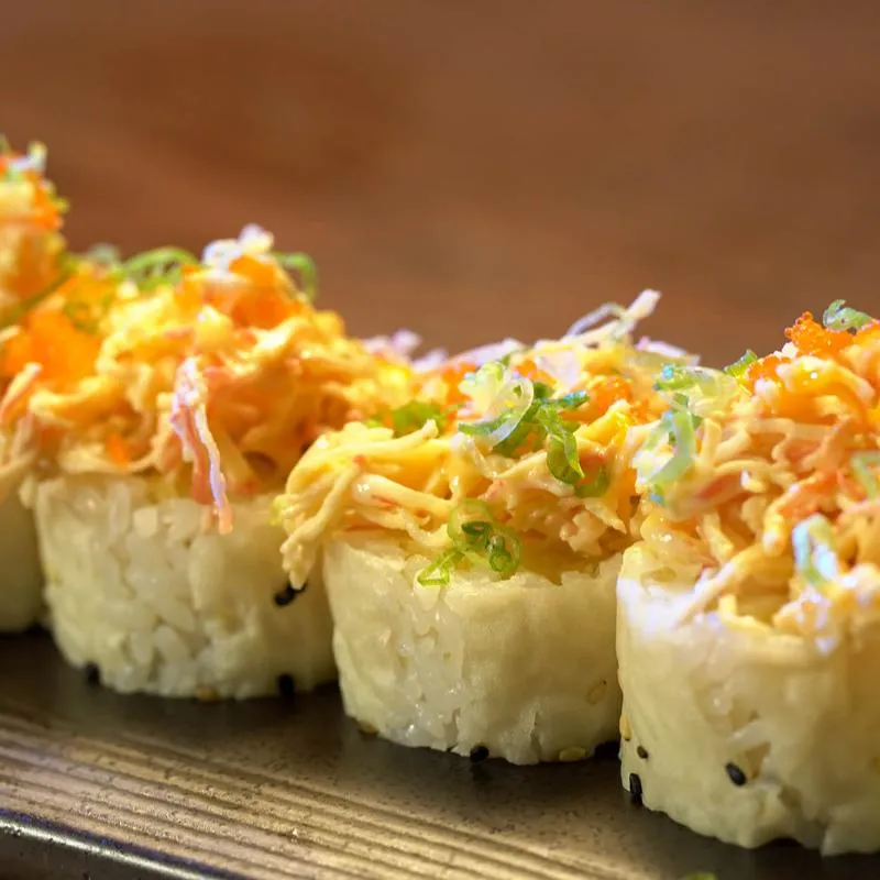 Lobster sushi rolls, topped with crunch.