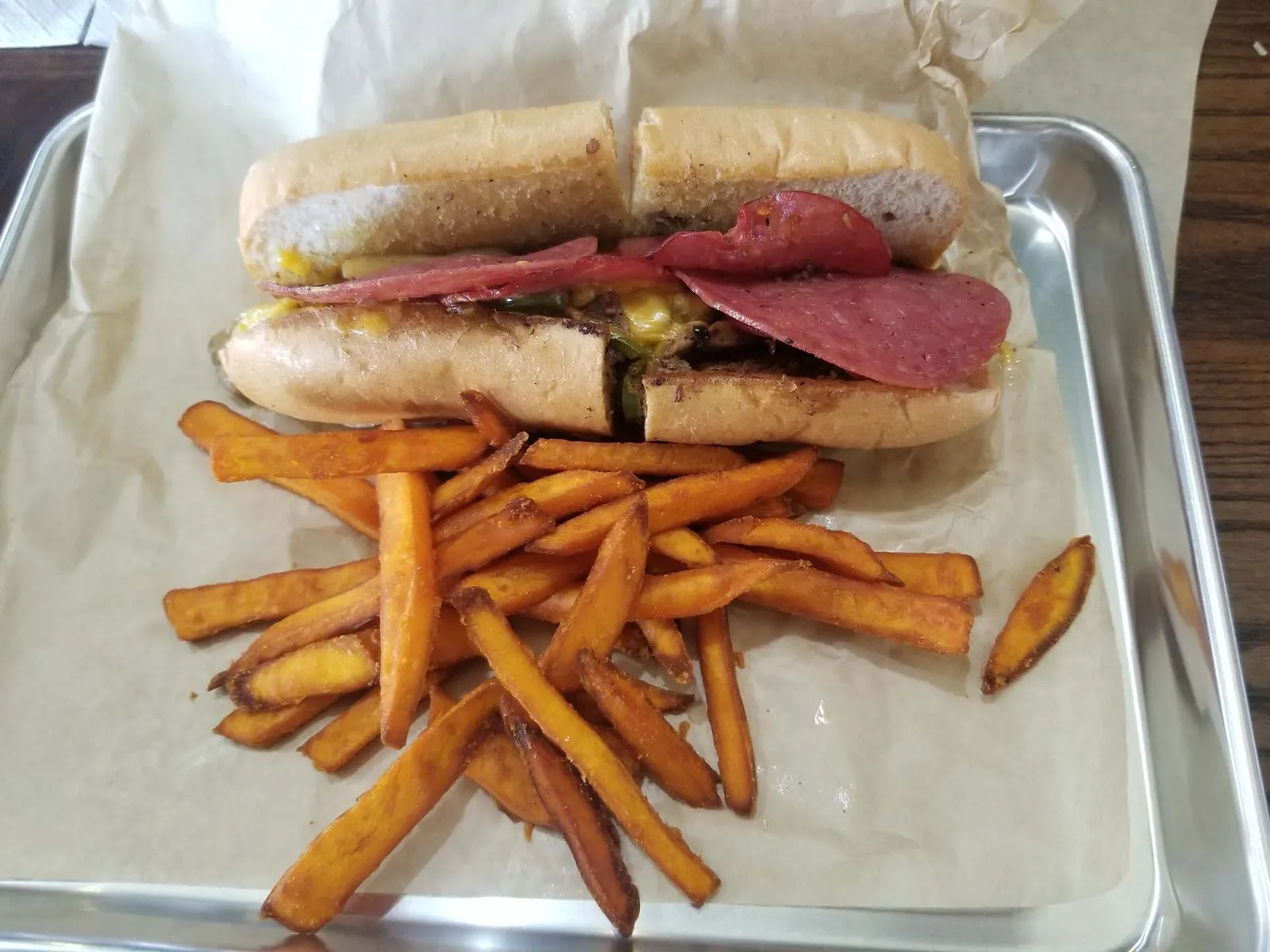 a sandwich with french fries