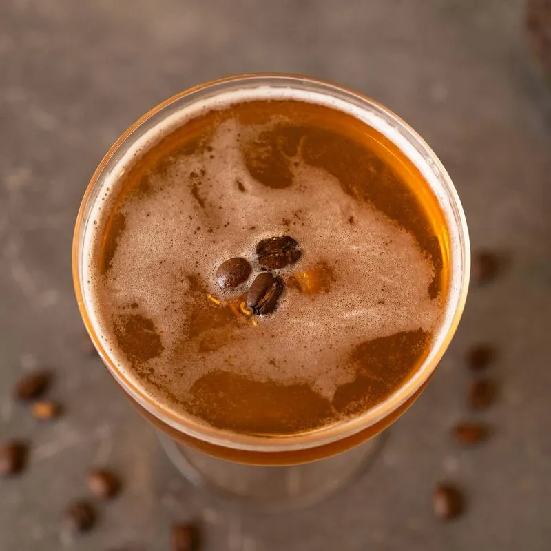 Tequilla Expresso Martini garnished with coffee beans.