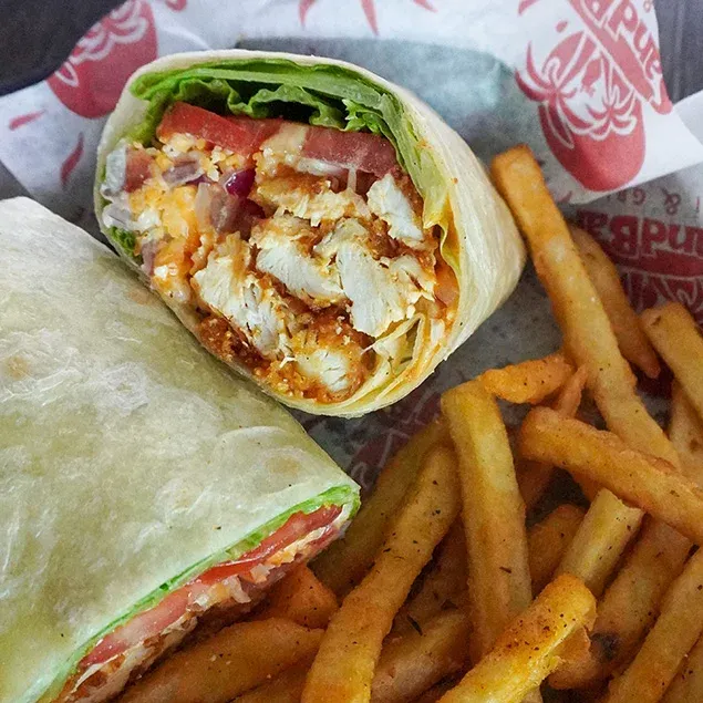 Fried chicken tenders, SandBar gold sauce, lettuce, tomato, onion, shredded Mexican blend cheese & ranch dressing.