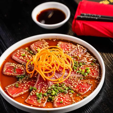 Tataki tuna dish and sauce on the side.