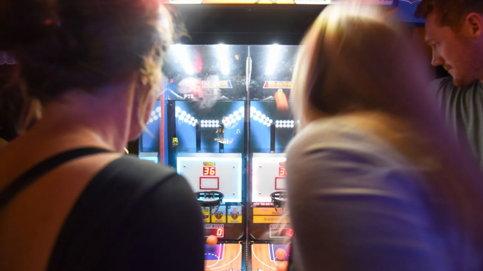 Head-to-head pop-a-shot basketball at Play Pensacola