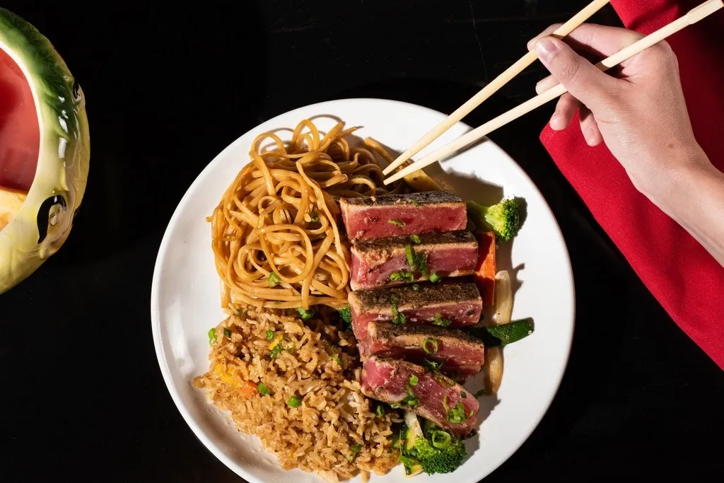 Tuna Tataki on plate with noodles and rice at Kobé Japanese Steakhouse in orlando and tampa area