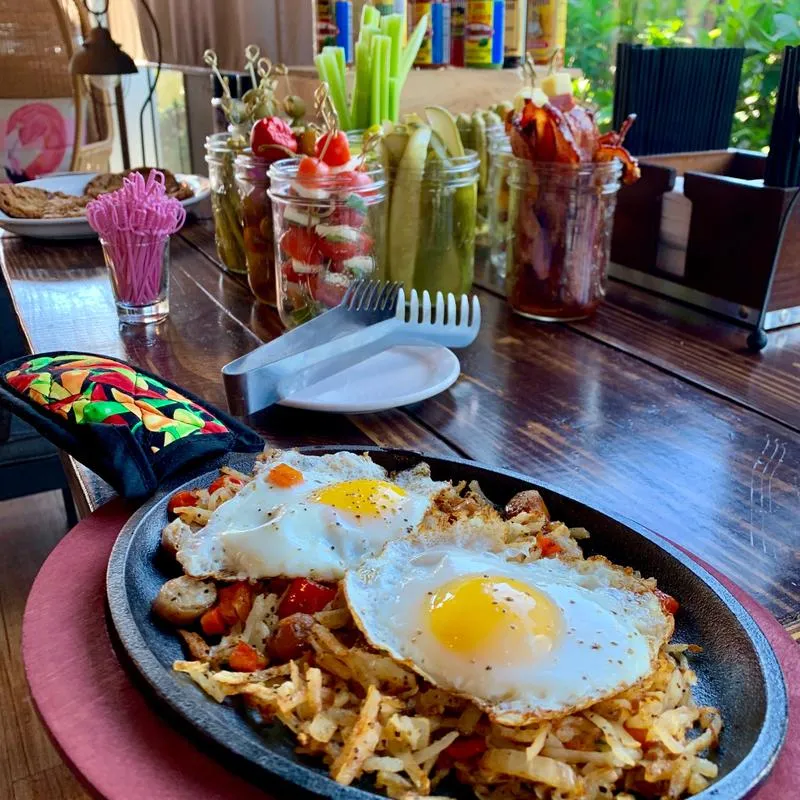 Skillet breakfast topped with two sunny eggs.