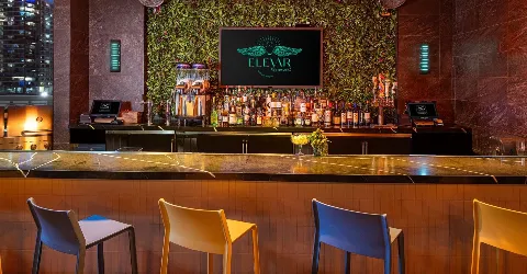 A Bar With A Large Screen