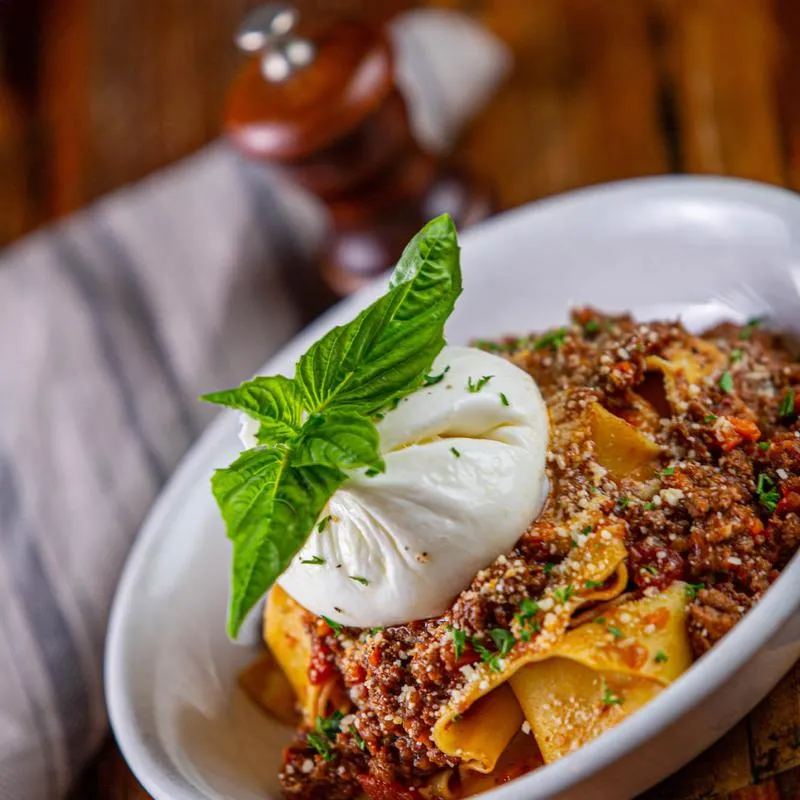 Decorated pasta and meat with sauce
