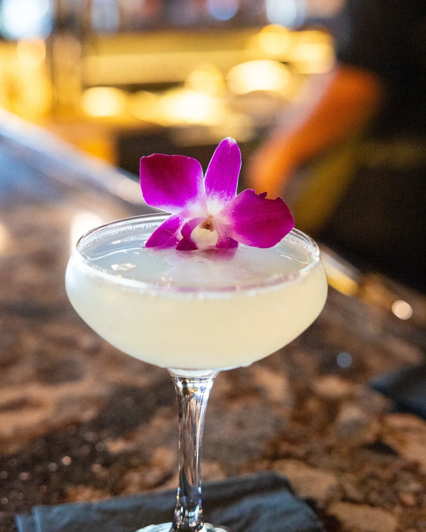 Art in a glass. 🌸✨ Elevate your evening with a beautifully crafted, refreshing cocktail poured to absolute perfection.