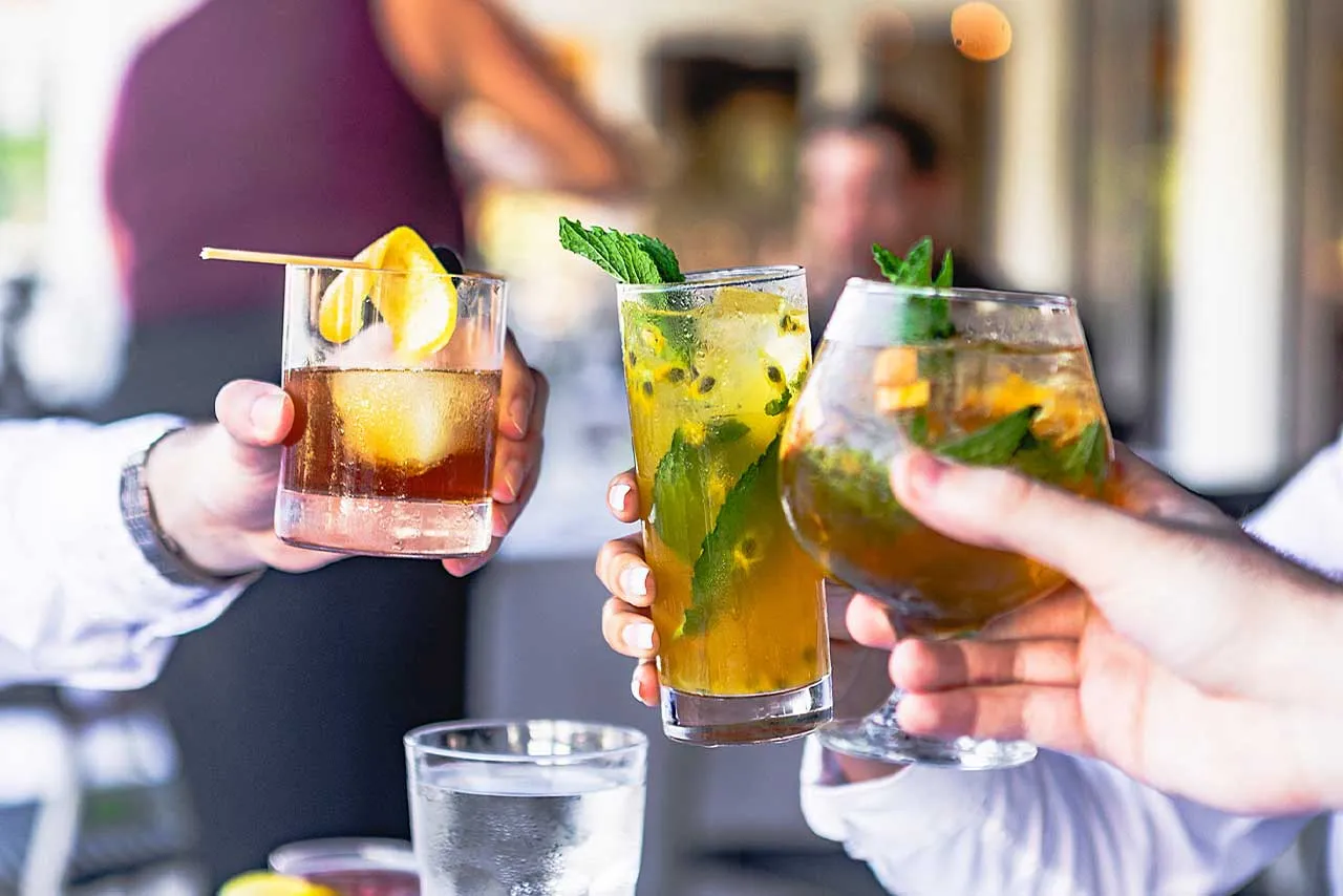 Toasting various cocktails