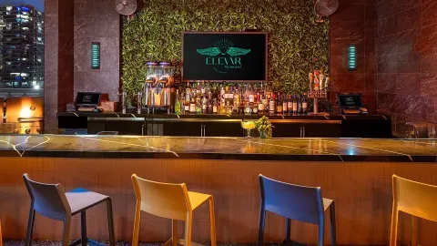 A Bar With A Large Screen