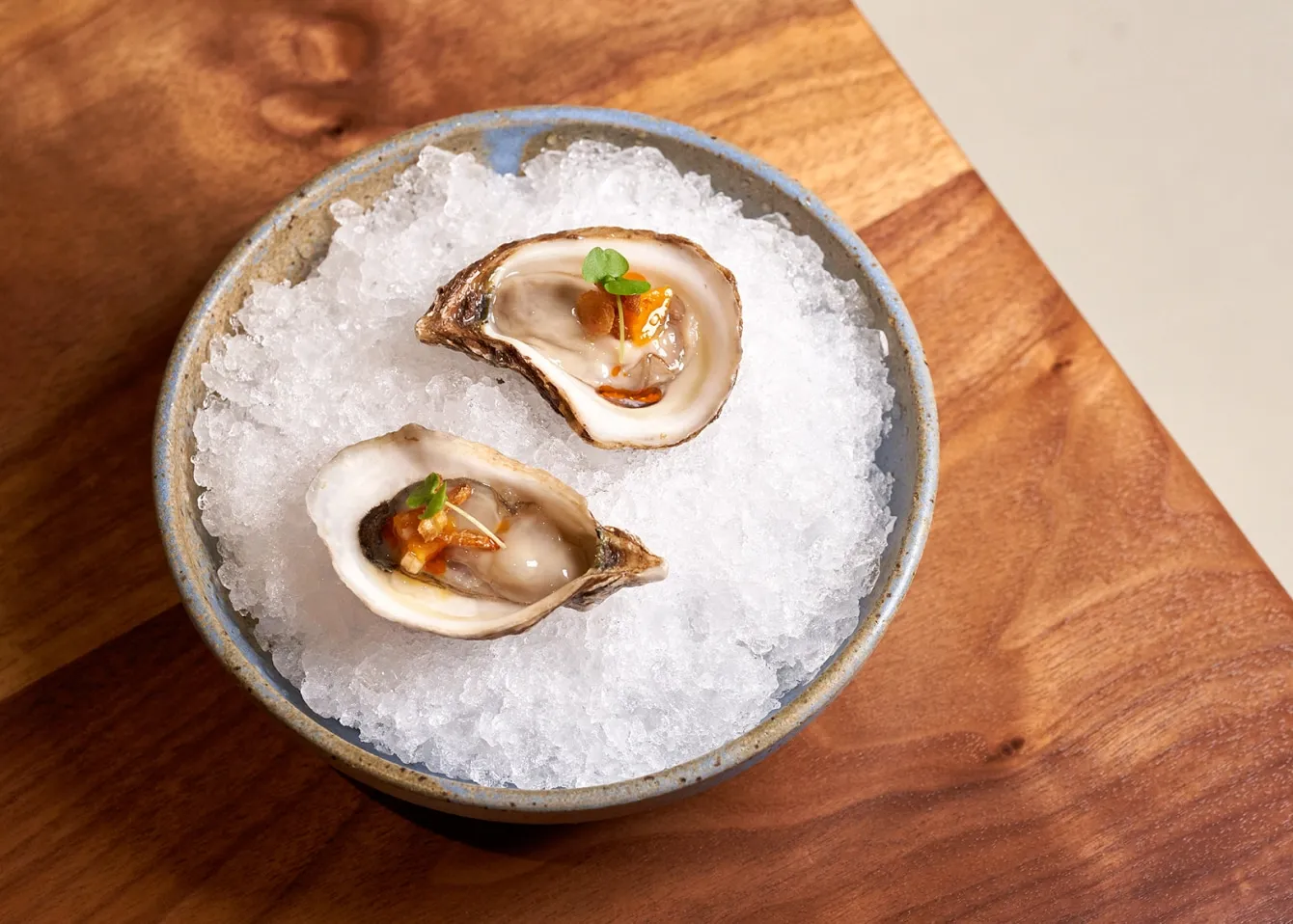fresh oysters on ice at uchi miami sushi restaurant