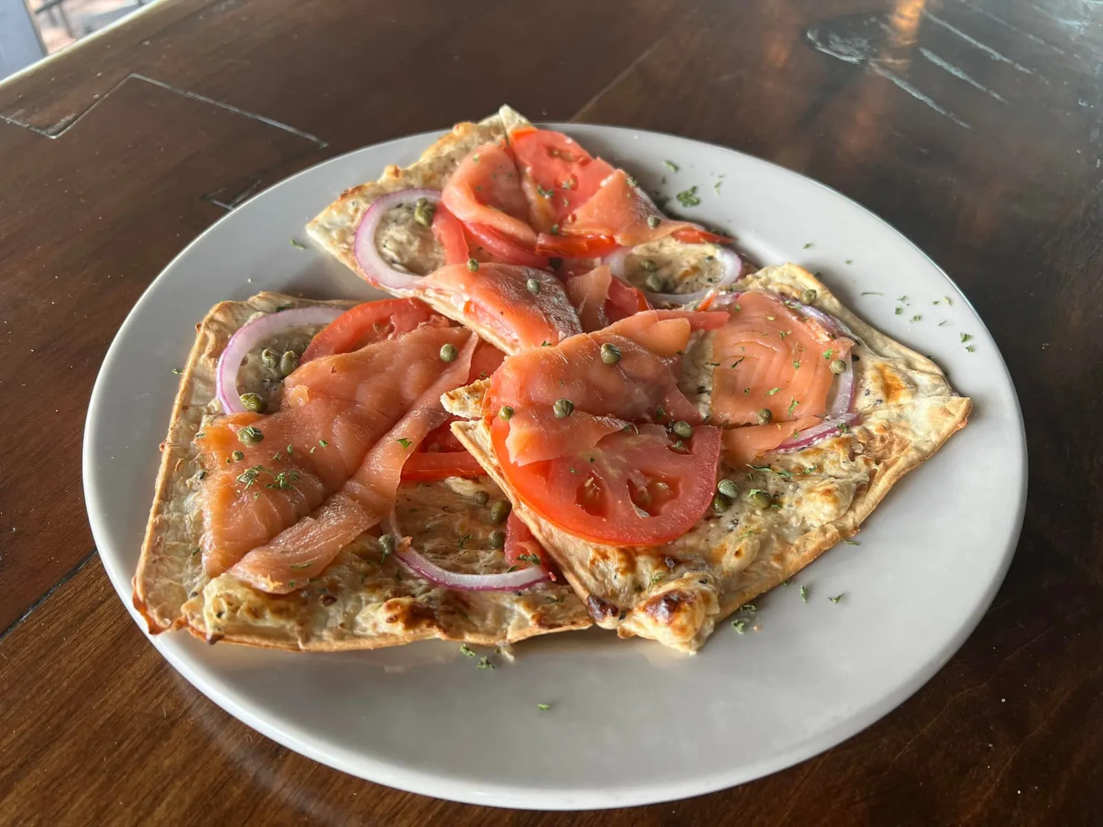 Smoked Salmon Flatbread with Red Onion, Tomato, Capers, and Cream Cheese