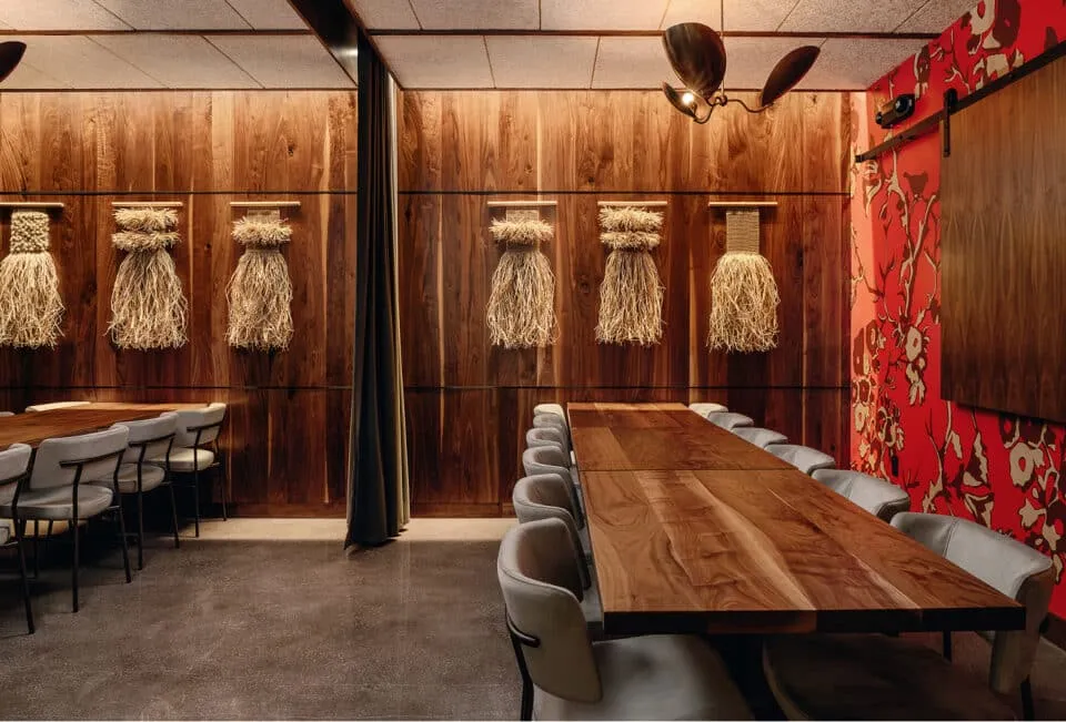 Modern private dining room with wood panel walls and contemporary décor at Uchi Sushi Restaurant Miami