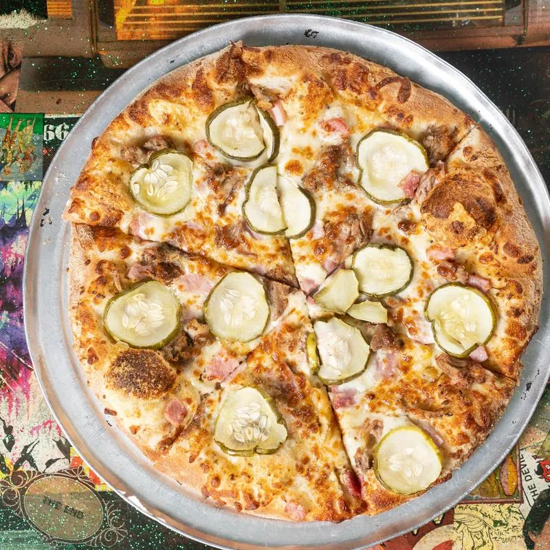 The Cuban pizza with pulled pork, mustard sauce, ham, pickle and cheeses