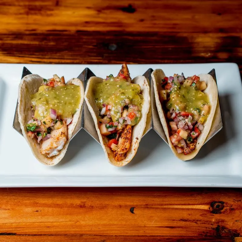 Served Mahi tacos.