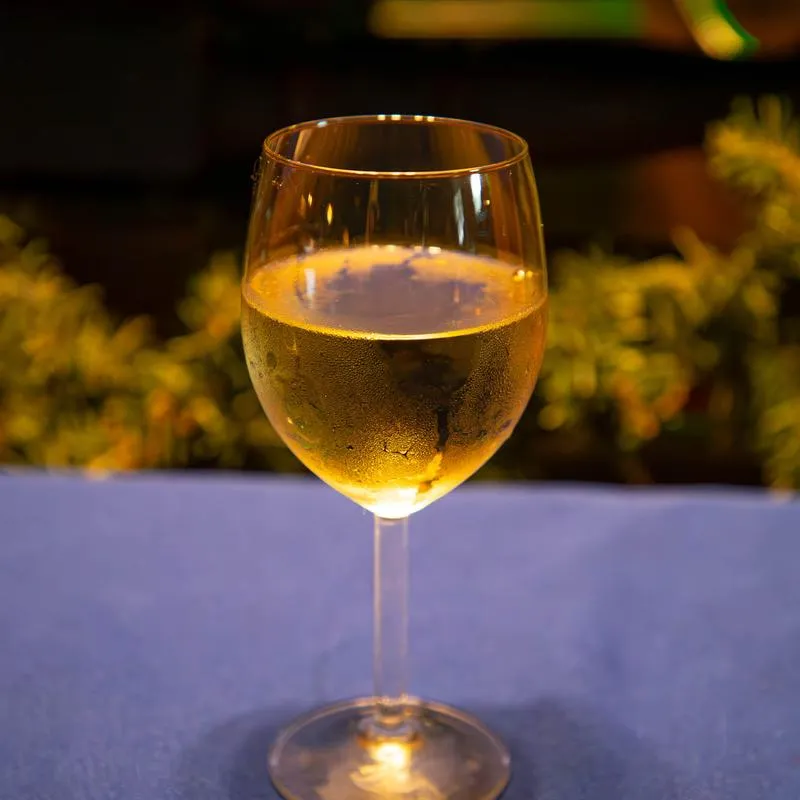 A glass of white wine.