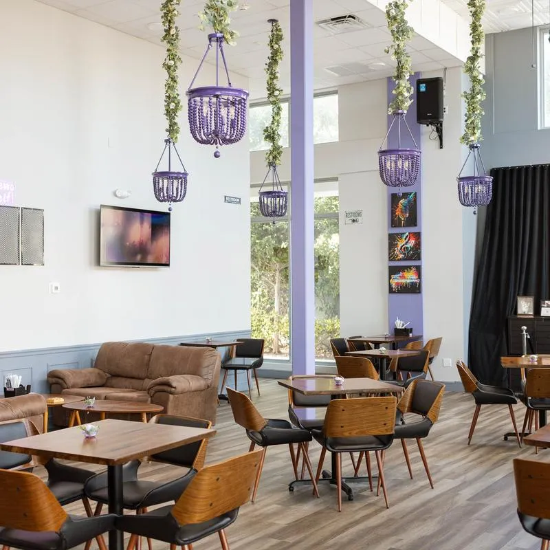 Interior, diner area, tables, chairs.
