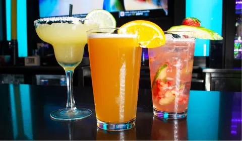 Three drinks on the bar at GameTime
