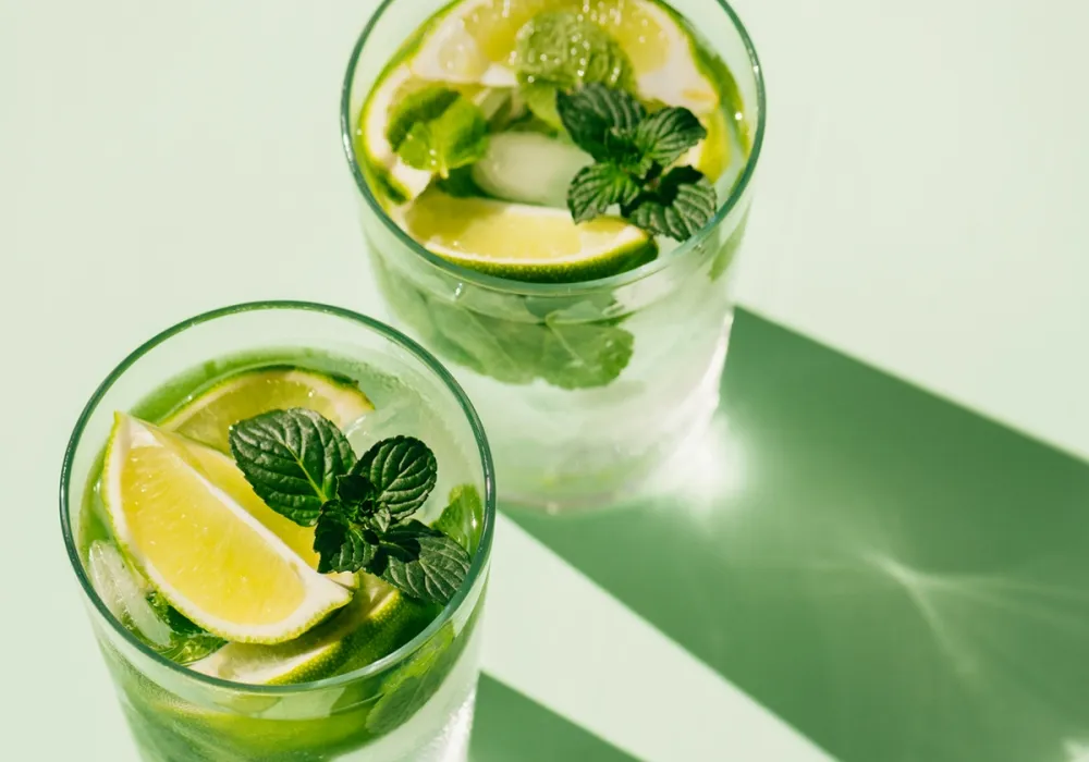 Two mint green cocktails