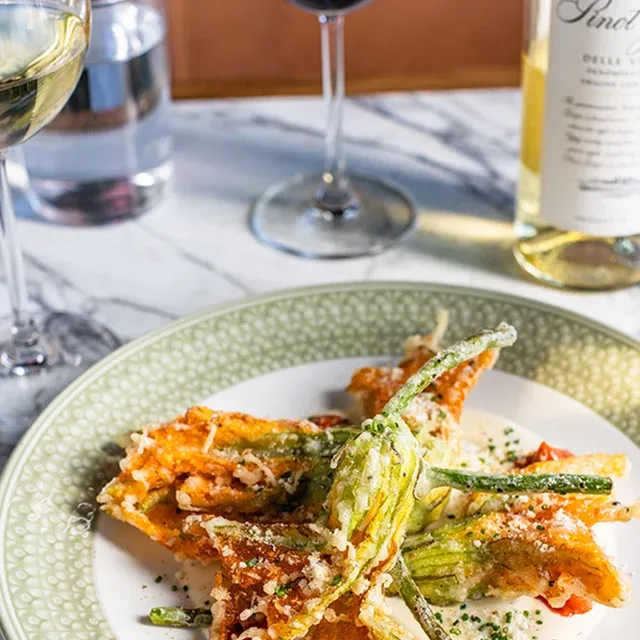 Image of Squash Blossom on a white and green plate