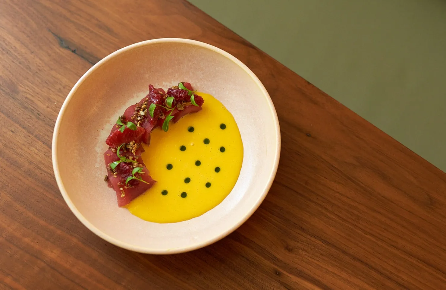 uchi miami sushi restaurant tuna crudo with mango sauce and herbs