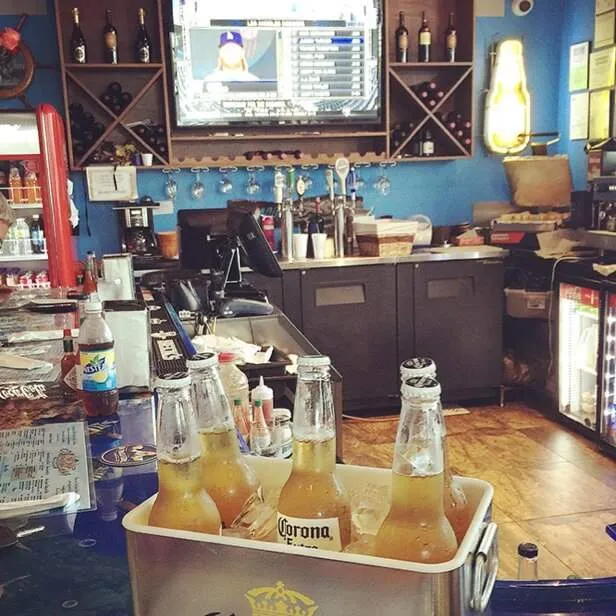 view of the bar with a bucket of corona