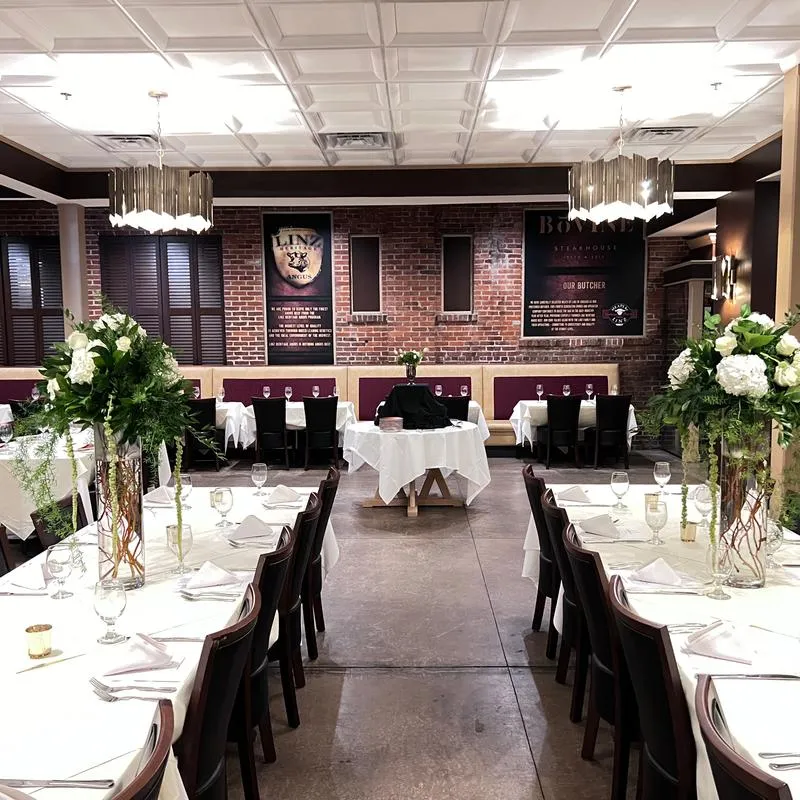 Main dining room decorated for a luncheon..