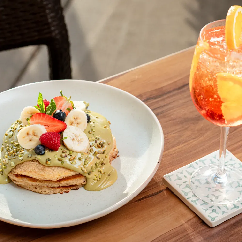 Pistachio Creme Pancakes with Aperol Spritz