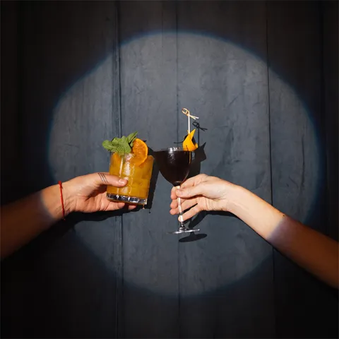 Bartender preparing a signature cocktail at Heyday Miami
