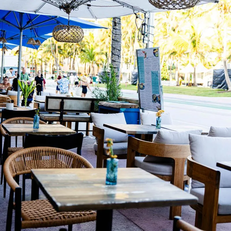 Tables and chairs outside.