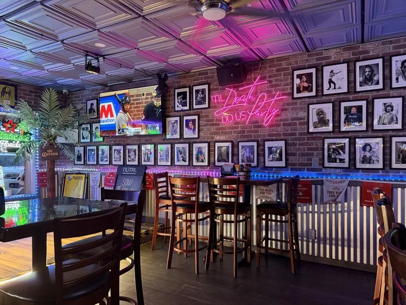The Legends wall and 'Til Death Do Us Party neon sign
